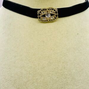 Black Velvet Choker Necklace with an Ornate Gold Tone Pendant and Crystals